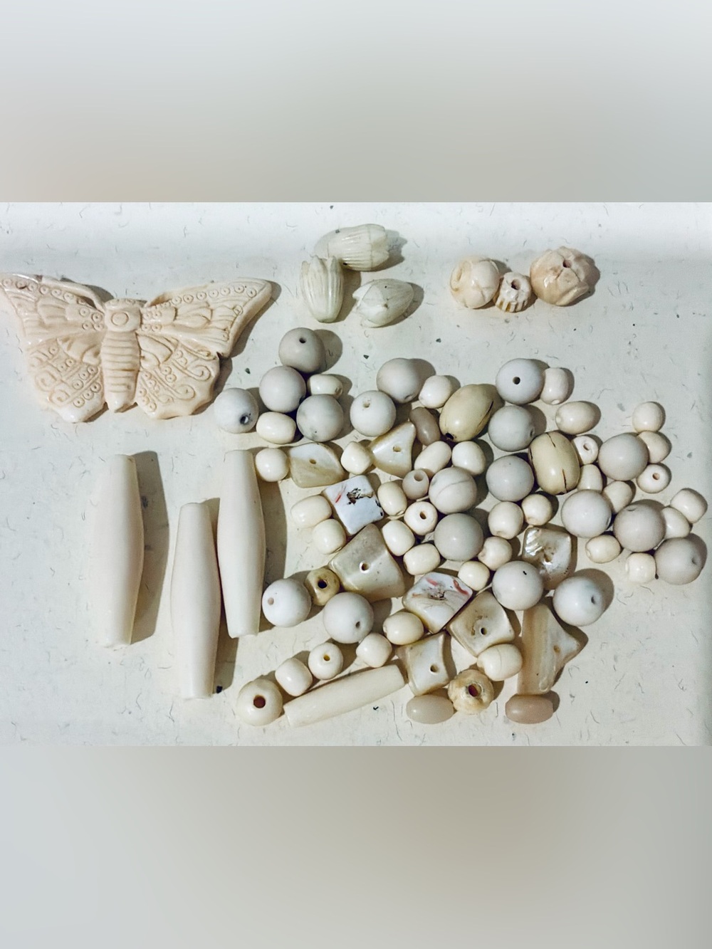 Carved bone bead lot
